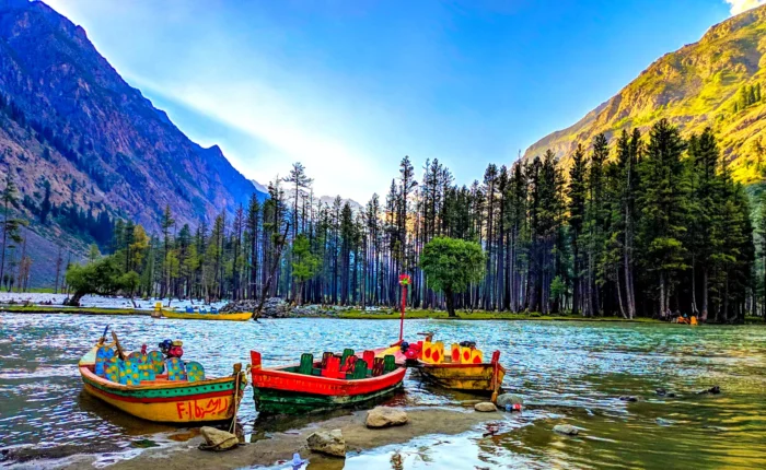 Panoramic view of boats floating on Mahodand Lake in Swat Valley, Pakistan.