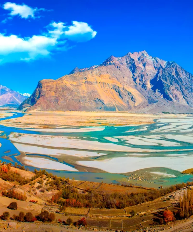 A picturesque view of rivers meeting along Shigar Valley Road.