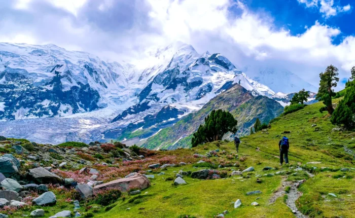 Scenic view of people hiking to Rakaposhi Glacier in Minapin, along the Karakoram Highway, Pakistan.