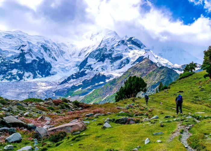 Scenic view of people hiking to Rakaposhi Glacier in Minapin, along the Karakoram Highway, Pakistan.