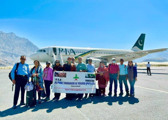 Group of tourists at Skardu Airport, ready to start their luxurious tour with Alpine Trekkers and Tours